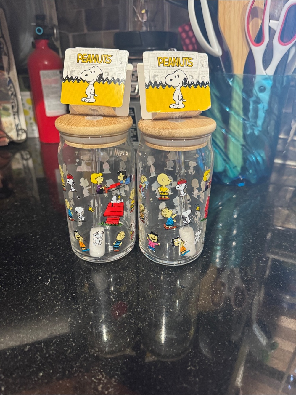 Peanuts Glass Canister Pair with Yellow Snoopy Toppers